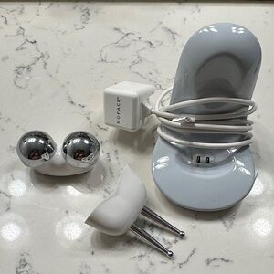 Silver and White Facial Toning Device